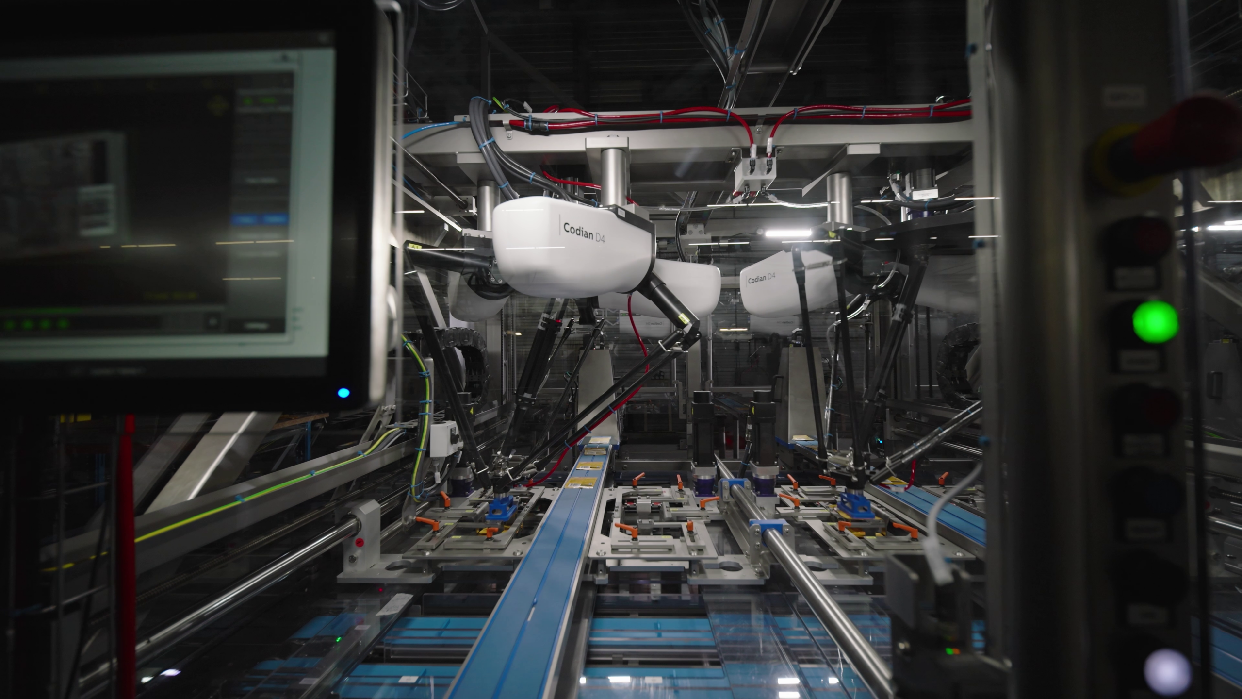 Engineers reviewing the robotic control software